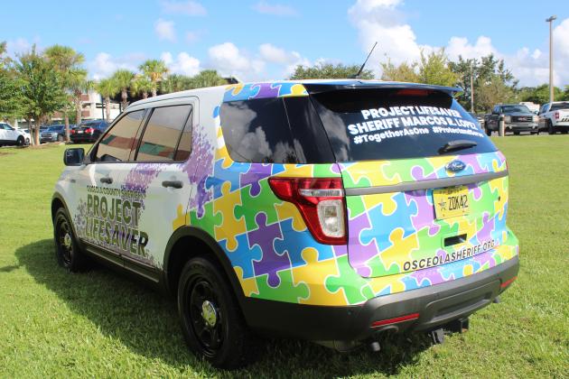The Sheriff's Office commissioned a cruiser, decked out in colors to honor autism, for Project Lifesaver. PHOTO/KEN JACKSON