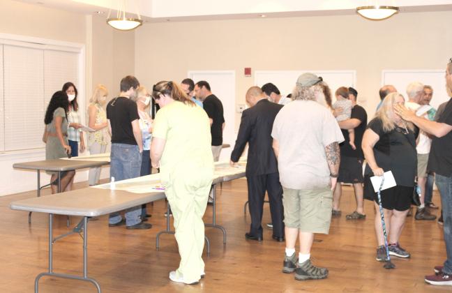 Residents view the conceptual Lakefront plan and speak with staff at the Oct. 6 public meeting. SUBMITTED PHOTO