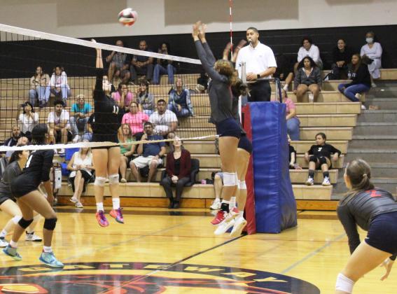 Gateway's Paige Alise (11) goes up for a kill against Fivay in Wednesday's regional volleyball playoff victory, the first in school history. PHOTO/KEN JACKSON