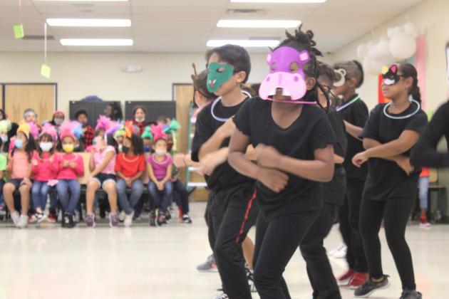 Second-graders at Renaissance Charter School at Poinciana perform a dance number to “Can’t Stop the Feeling” at Thursday’s Lights On Afterschool event, which highlighted the importance of after-school care programs. PHOTO/KEN JACKSON