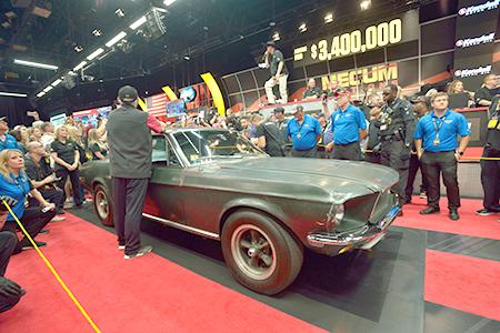 A 1960s Ford Mustang crosses the auction block at the 2019 Kissimmee Mecum Auto Auction. PHOTO/MECUM