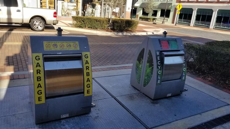Recycling goes into a receptacle like this, on Darlington Street in downtown Kissimmee, and is kept in an underground bin. A special truck comes to empty the entire bin at once. PHOTO/KEN JACKSON