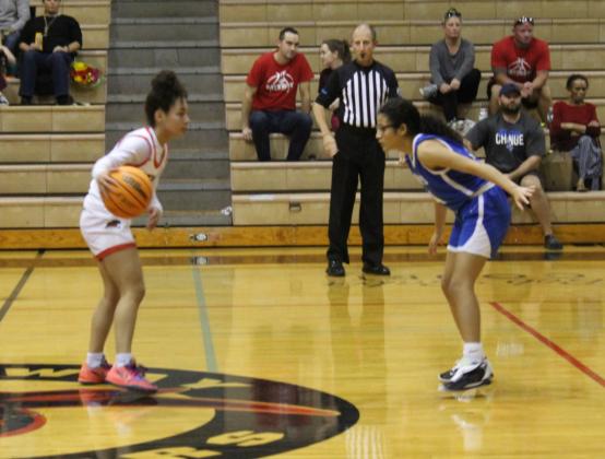 Gateway point guard Neri Moreau (with ball) looks to score or distribute as Osceola's Destiny Kim guards her Tuesday in the Panthers' 91-33 win.