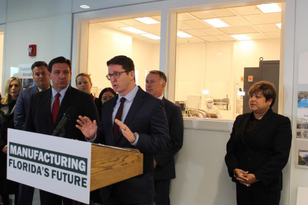 Florida Department of Economic Opportunity Secretary Dane Eagle speaks about the benefit of the state funding handed out at NeoCity Wednesday. PHOTO/KEN JACKSON