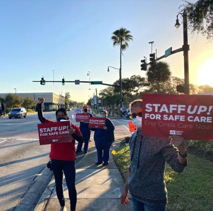 A group of Osceola Regional Medical Center nurses rallied Thursday morning regarding staffing and working condition issues at the Kissimmee hospital. PHOTO/National Nurses Organizing Committee 