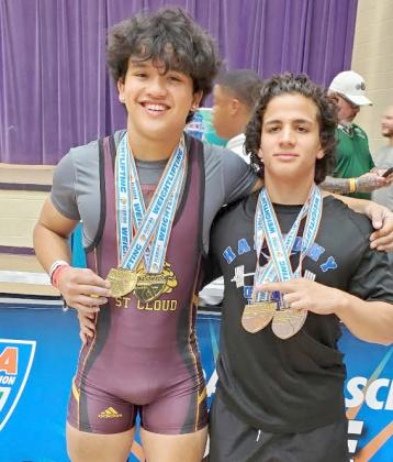 St. Cloud’s Julian Sykes (left) and Harmony’s Isaac Balado (right) with their hardware from the Class 3A state weightlifting meet, are the county's Boys Weighlifters of the Year. PHOTO/CORY AUN, ST. CLOUD H.S.