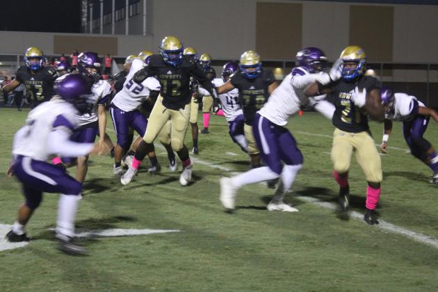 OHS running back Taevion Swint, shown here in a 2021 game, had 69 yards on 13 carries Thursday — but came up big on the game-winning drive.