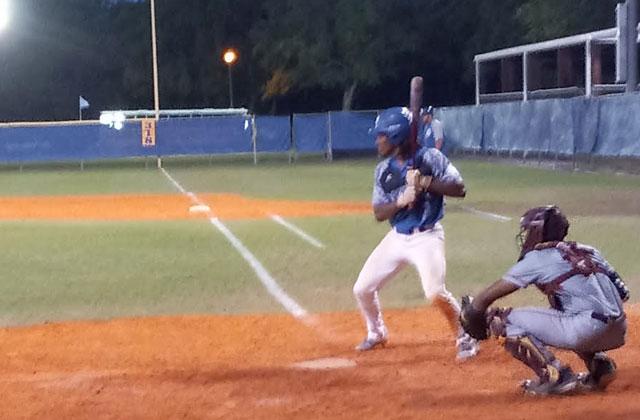 Osceola center fielder Isaiah Jean Baptiste (batting) reached base three times and scored twice in Osceola's 6-4 win over St. Cloud (Photo J. Daniel Pearson)