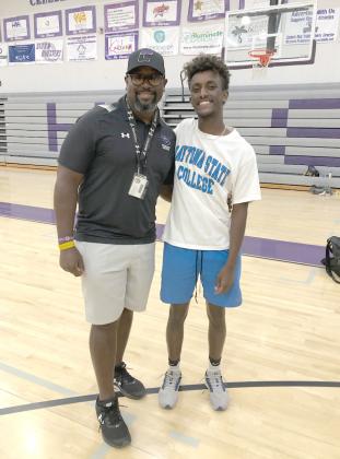 Celebration’s Jared Falchook, pictured with Coach Cliff Branch, closed out his Storm career with a fifth-place finished at the Class 4A state meet, and played a key role in getting the 4x400 and 4x800 relay teams through to the state championships. SUBMITTED PHOTO