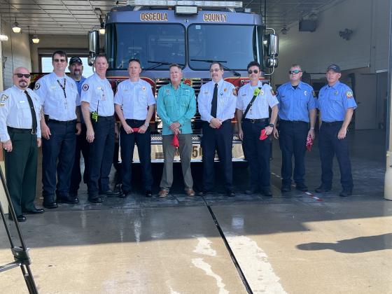 Firefighters of Station 65, along with County Commissioner Brandon Arrington, with their newest engine