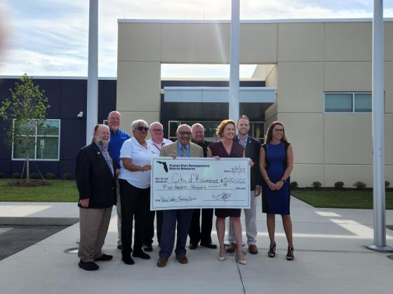 Kissimmee city and responder officials gather with the area's state legislators to present the training center funding. PHOTO/KEN JACKSON