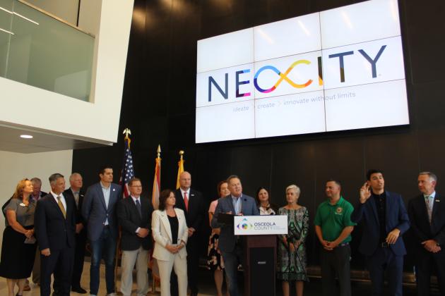 NeoCity and Osceola County partners gather Friday to announce a $50.8 million federal Build Back Better Challenge award to fund upcoming NeoCity semiconductor manufacturing projects. PHOTO/KEN JACKSON