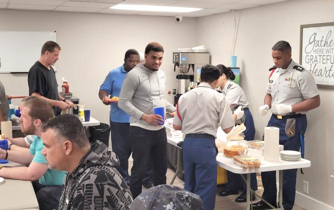ARMY ROTC St. Cloud Army ROTC cadet sergeants supervise cadets serving lunch to Transition House residents on Dec. 10. PHOTO/ST. CLOUD HIGH