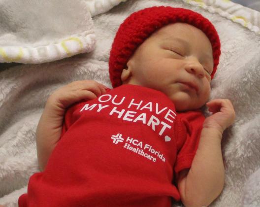 Newborns at HCA Florida Osceola Hospital were outfitted in special  “You Have My Heart” onesies to raise awareness of heart disease. PHOTO/HCA