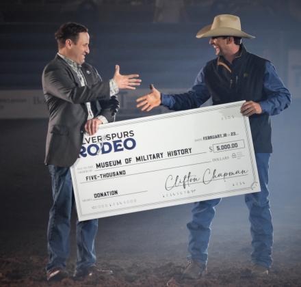 The Silver Spurs Riding Club made a charitable donation to the Osceola Museum of Military History during last weekend's rodeo. PHOTO/KATIE WILLIAMS