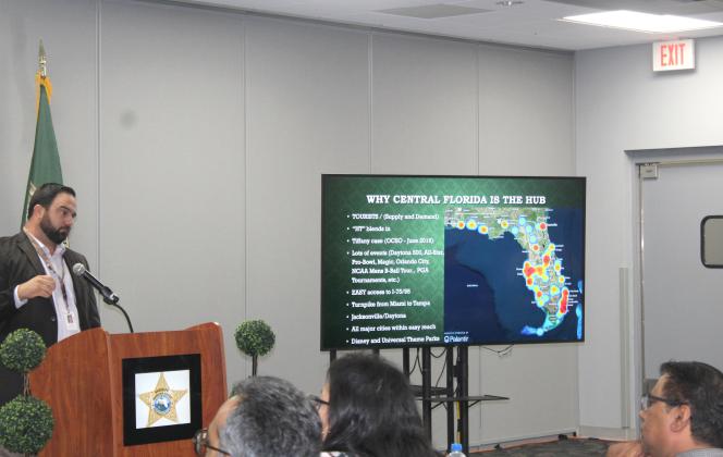 Osceola Sheriff’s Det. Justin Akins explains where the “hot spots” for human trafficking in Florida — and why — at an awareness conference Feb. 23 in Kissimmee. PHOTO/KEN JACKSON