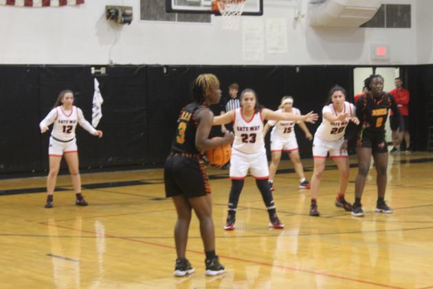 The Panthers lock down on defense  in Gateway's 51-34 district championship win over Jones. PHOTO/KEN JACKSON