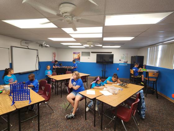 Children play games and do some activities Friday during the St. Cloud Boys & Girls Club's opening ceremony. PHOTO/KEN JACKSON
