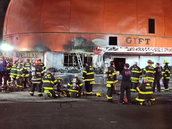 Some two dozen Osceola County Fire Rescue members put out a blaze Tuesday night at Orange World in West U.S. 192. PHOTO/KEN JACKSON