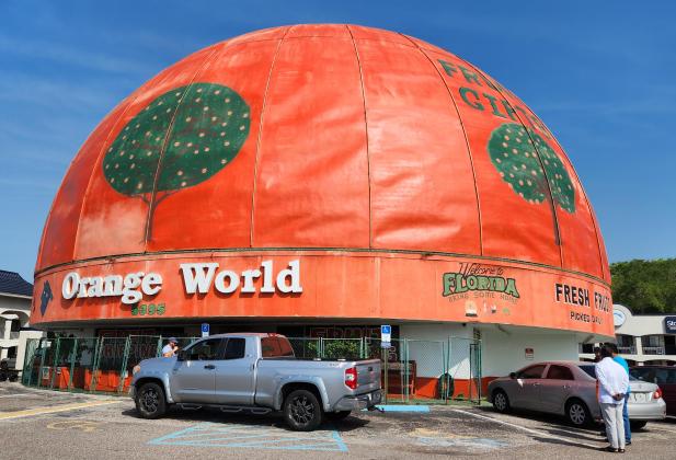 From the U.S. 192 side of the front of Orange World, there's no sign of Tuesday's fire. Many unknowing customers came Wednesday looking to shop. PHOTO/KEN JACKSON