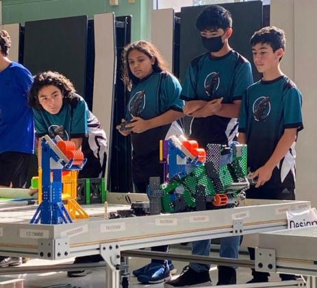 The Techno Titans of the Osceola Science Charter School VEX World Championships robotics teams puts its models through its paces ahead of next week’s competition. PHOTO/MING HENRY