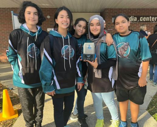 The Combat Wombats of the Osceola Science Charter School VEX World Championships robotics teams puts its models through its paces ahead of next week’s competition. PHOTO/MING HENRY