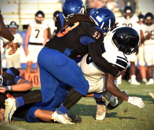 Mekhi Ealy had one of Harmony's tackles for loss in Friday's game against Eustis. PHOTO/KATIE WILLIAMS