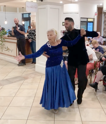 Competitive ballroom dancer Jeannette Dunstan with her partner Eddie Rivera. SUBMITTED PHOTO