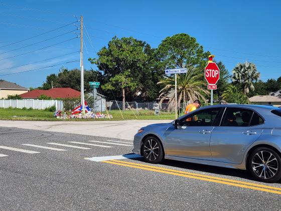 Traffic now is signed to stop on San Miguel Road at Laurel Avenue in Poinciana, the site of a deadly Sept. 3 crash. PHOTO/KEN JACKSON