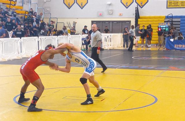 Osceola’s Anderson Heap (right), a two-time state champion, will be a top seed in the 150-pound class the Knockout Christmas Classic. PHOTO/J. DANIEL PEARSON