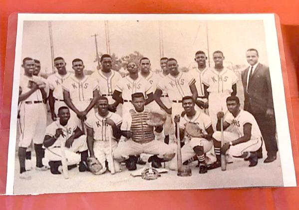 The Kissimmee High School baseball team from the 1960s, with coach, P.E., health and driver’s education teacher Nelson Winbush.