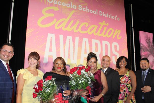 Osceola Technical College Medical Assistant Instructor Vanessa Gomez (right, with flowers) and Tohopekaliga High School Executive Secretary Dawn Parker have been named this year’s School District of Osceola County Teacher of the Year and School-Related Employee of the Year. PHOTO/KEN JACKSON