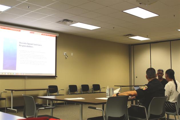 Members of the Osceola Opioid Task Force go over what will be part of next week's presentation to Osceola County Commissioners at its meeting Monday. PHOTO/KEN JACKSON