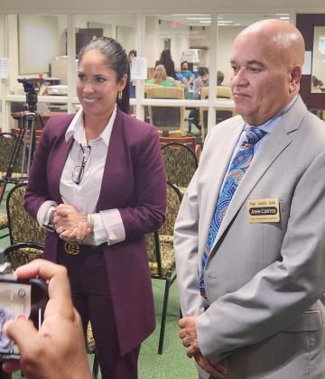 Olga Carino and John Cortes spoke to the media Friday after a state-mandated recount showed Cortes had six more votes and would be moving on to the Nov. 5 Kissimmee mayoral general election. PHOTO/KEN JACKSON
