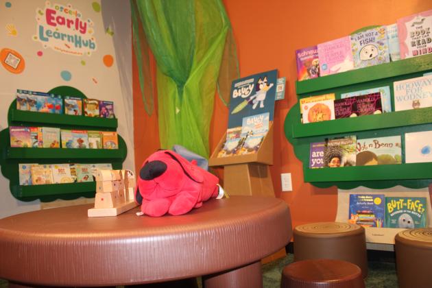 White Rose Books in downtown Kissimmee is home to one of the Early Learning Coalition's "Early LearnHubs", which hope to engage children with reading in places they'd already be with their families. PHOTO/KEN JACKSON