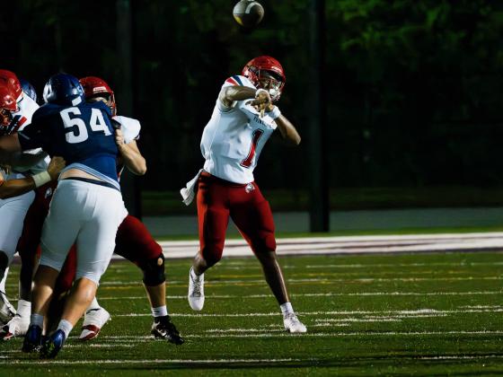 Poinciana quarterback Cameron Brown fires a pass in the Eagles' 34-14 Friday over Celebration. Brown threw for 237 yards and three touchdowns, and committed no turnovers. PHOTO/MARIO CASAMALHUAPA