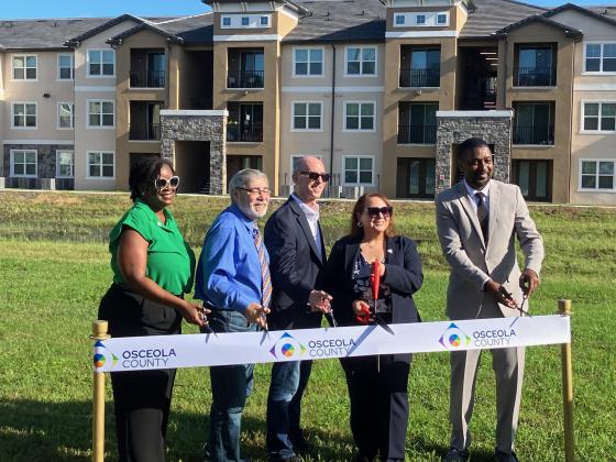County officials gathered Wednesday to officially open the second phase of Cameron Preserve, adding to Osceola’s inventory of affordable housing. PHOTO/DAVID CHIVERS