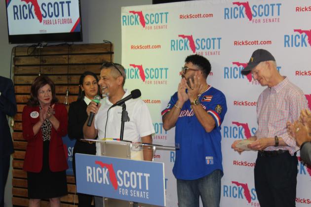 Sen. Rick Scott, joined by local Hispanic coalition leaders and elected officials, came to Kissimmee Thursday to rally support for the election.  PHOTO/KEN JACKSON