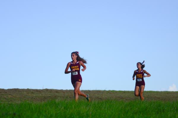 St. Cloud's Lailana Decker and Kyla Perez run out front in Wednesday's GIRLS OBC race. PHOTO/DONALD LAMB