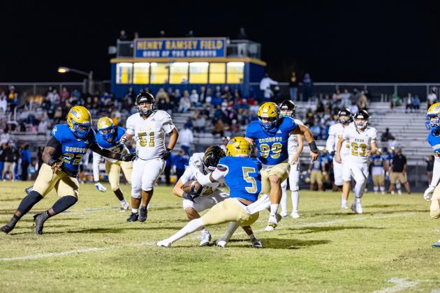 Osceola defensive back Jeff Banks brings down a Viera ball carrier Friday. PHOTO/TAYLOR MCFEE