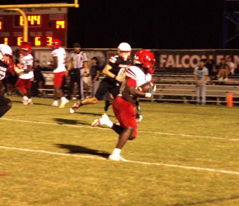 Will Nezius coasts to a third-quarter touchdown to put the Eagles up 28-7. PHOTO/ANDY SURUJDYAL