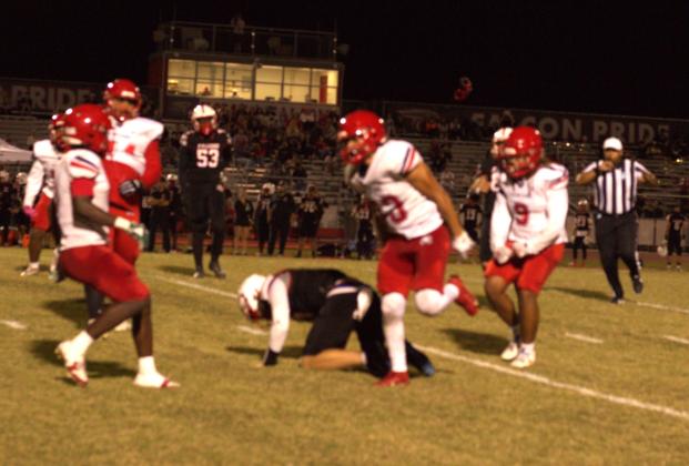 The Eagles defense dropped an East River ball carrier for another loss. PHOTO/ANDY SURUJDYAL