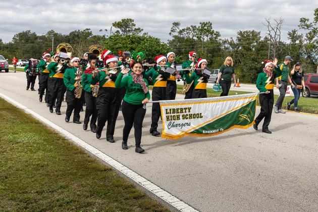 The 29th annual APV Poinciana Christmas Parade down Cypress Parkway will require the closure of some local roads Saturday. FILE PHOTO