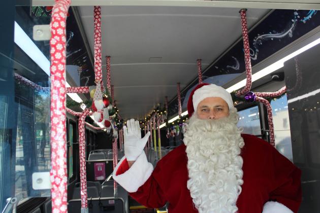 Santa—a.k.a. LYNX bus driver Edwin Cartagena—made some riders’ day. Those who rode on his Monday routes through Kissimmee and St. Cloud got a free ride. PHOTO/KEN JACKSON