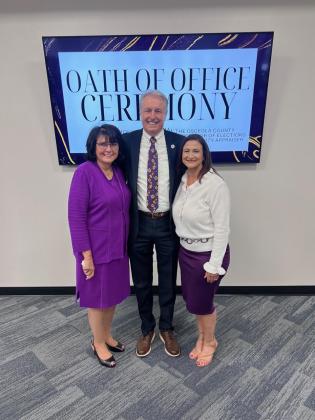 Supervisor of Elections Mary Jane Arrington were sworn in for their fifth terms, and Tax Collector Bruce Vickers his third, this week, joined by their families. PHOTO/OSCEOLA COUNTY PROPERTY APPRAISERS OFFICE