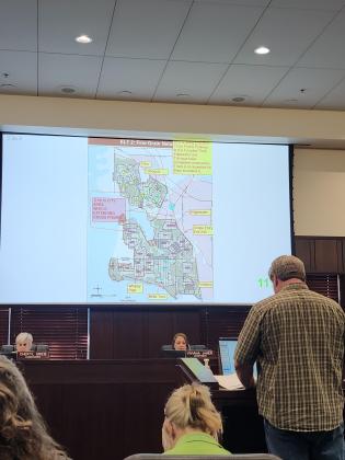 Residents discussed the deficiencies in traffic capacities in the area of Kissimmee Park at Monday's Osceola County Commission meeting. The board approved two new zoning changes for the area Monday. PHOTO/KEN JACKSON