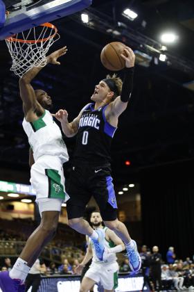 Mac McClung goes up for two of his game-high 42 points Sunday. PHOTO/TAYLOR MCFEE