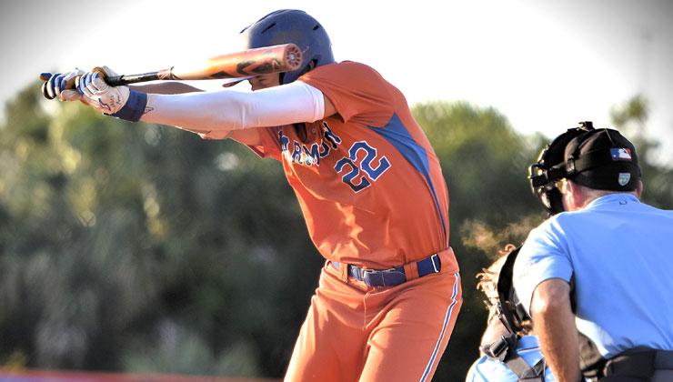 Harmony’s Jadiel Perez gets brushed back by a pitch in Thursday’s regional quarterfinal win over Lake Nona. The Longhorns play tonight to win or extend the semifinal best-fo-3 series against Jupiter. (Photo/Katie Williams)