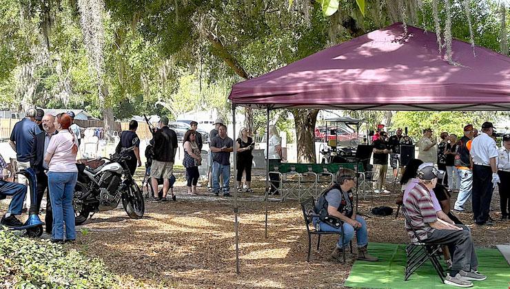 Over 100 people attended the memorial service for Marine veteran John Snider Saturday at Mount Peace Cemetery, that was followed by the McCormick Research Institute fundraising art show. (Photo/Terry Lloyd)