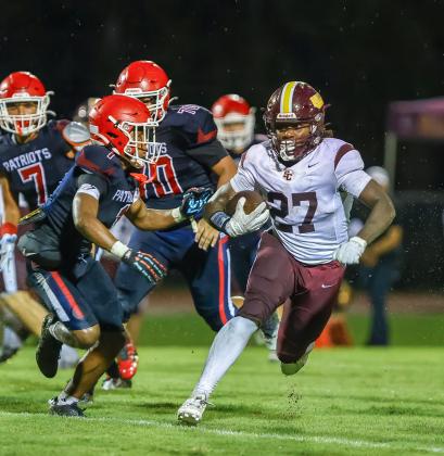 St. Cloud running back Cameron Dalton, shown here in the win over Freedom, ran for 90 yards and two scores in Friday's win over Poinciana. (Photo/Taylor McFee)